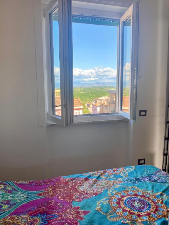 Postel nebo postele na pokoji v ubytování Way2Rome Apartments