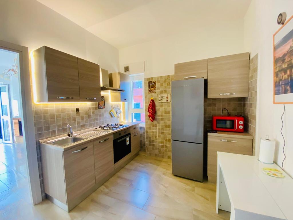 Kuchyň nebo kuchyňský kout v ubytování Way2Rome Apartments
