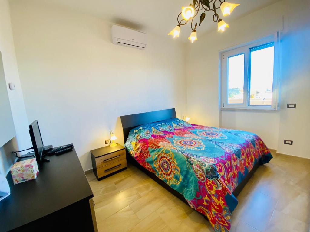 Postel nebo postele na pokoji v ubytování Way2Rome Apartments