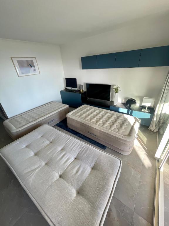 Postel nebo postele na pokoji v ubytování Appartement 2 pièces vue mer proche Monaco