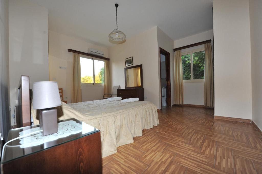 Postel nebo postele na pokoji v ubytování Jaime Villa Cyprus