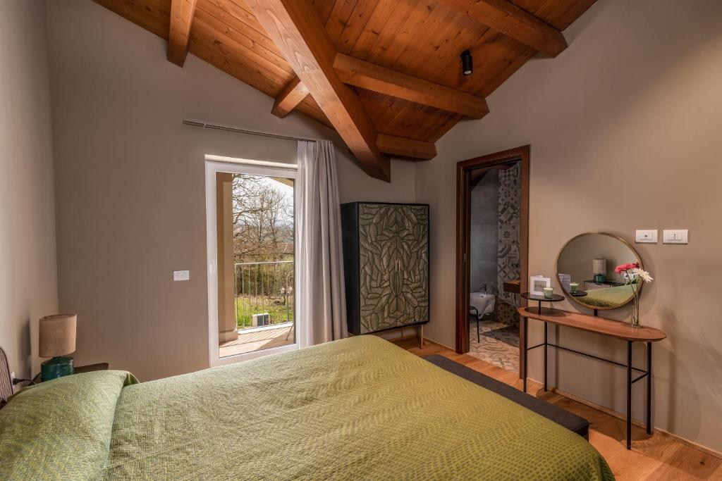 Posteľ alebo postele v izbe v ubytovaní Le Talee Agriturismo di Charme