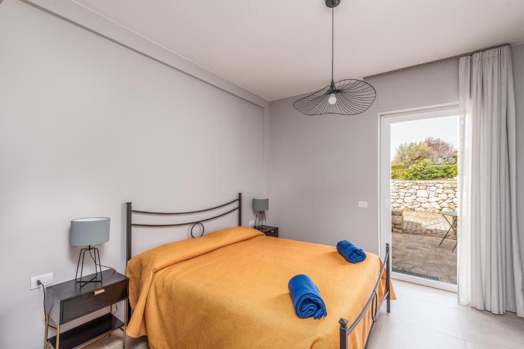 Posteľ alebo postele v izbe v ubytovaní Le Talee Agriturismo di Charme
