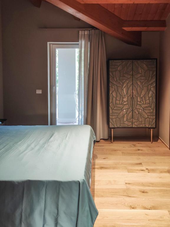 Posteľ alebo postele v izbe v ubytovaní Le Talee Agriturismo di Charme