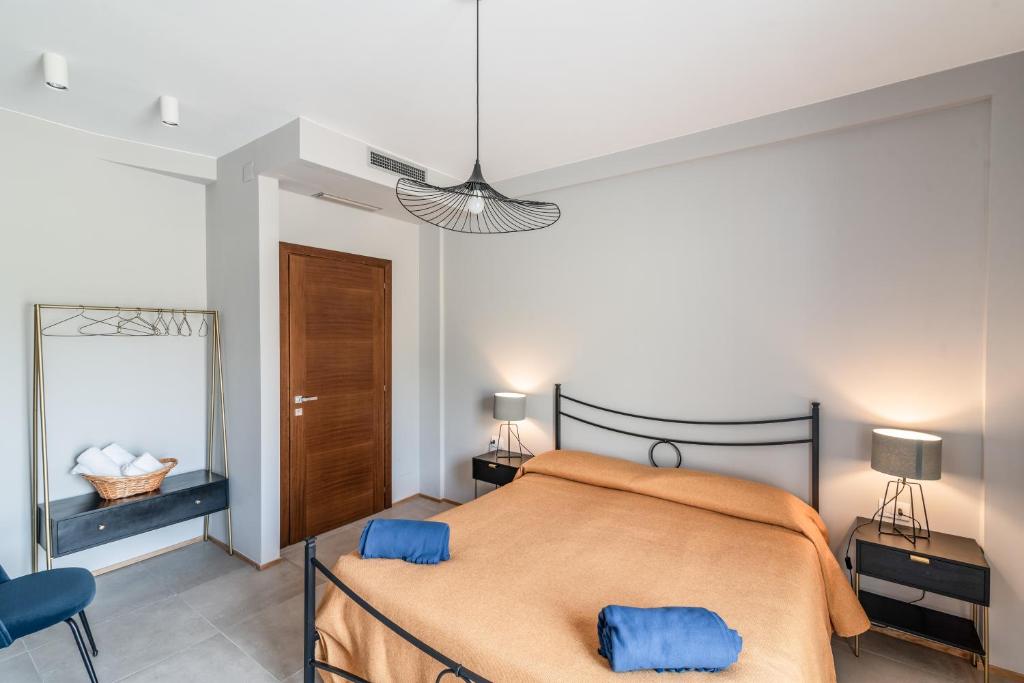 Posteľ alebo postele v izbe v ubytovaní Le Talee Agriturismo di Charme