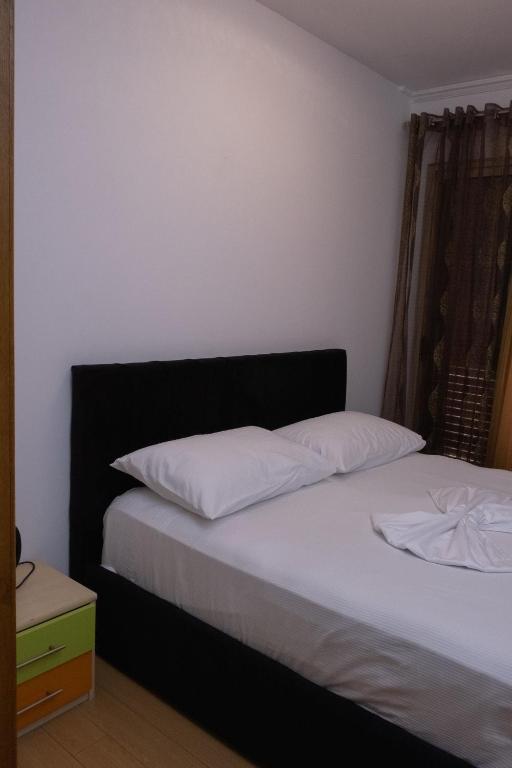 Postel nebo postele na pokoji v ubytování Albjona Guesthouse