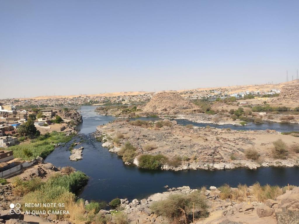 an aerial view of a river in the desert at Nubian Heights in Aswan