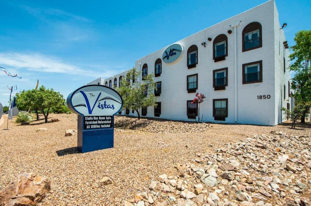 a building with a sign in front of it at Sierra Vista studio apartment with full kitchen and King Bed in Sierra Vista