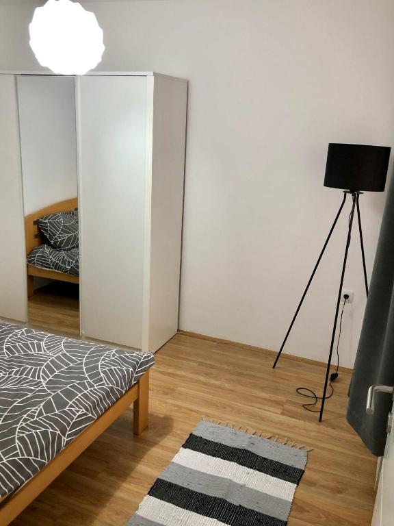 Postel nebo postele na pokoji v ubytování Aki