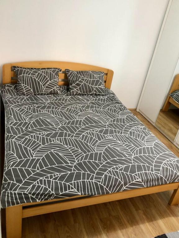 Postel nebo postele na pokoji v ubytování Aki