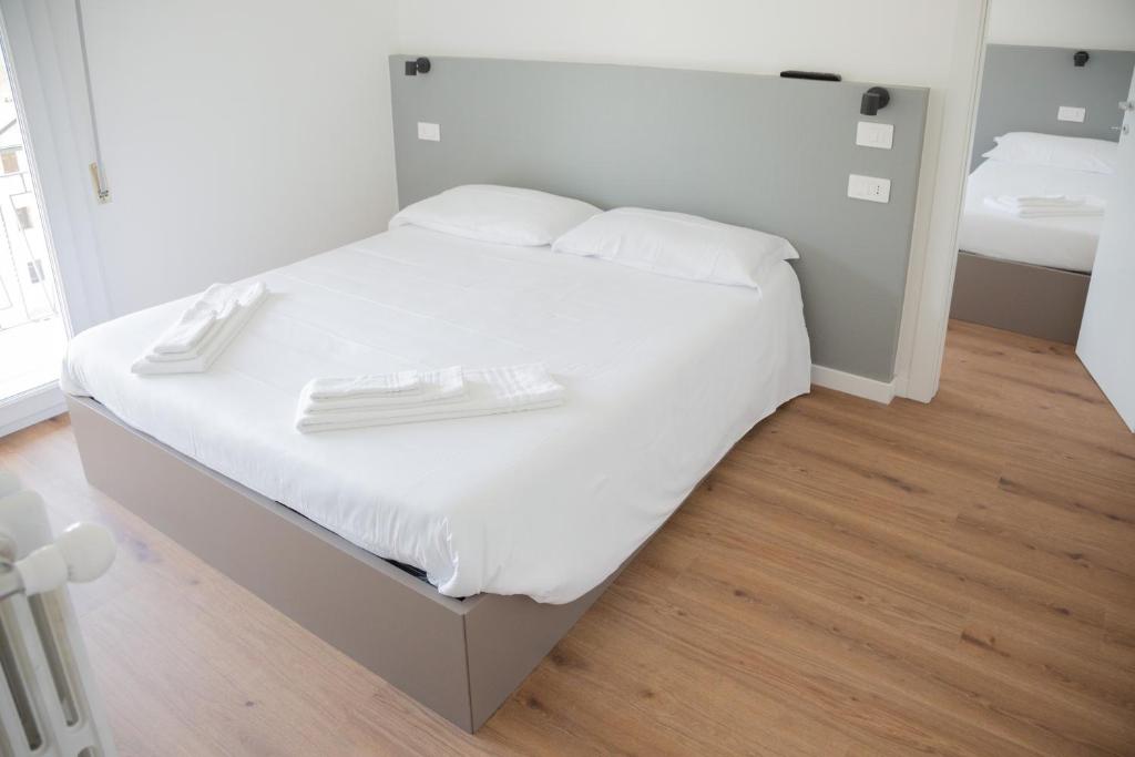 Postel nebo postele na pokoji v ubytování Albergo Panorama
