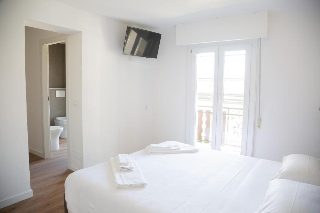 Postel nebo postele na pokoji v ubytování Albergo Panorama