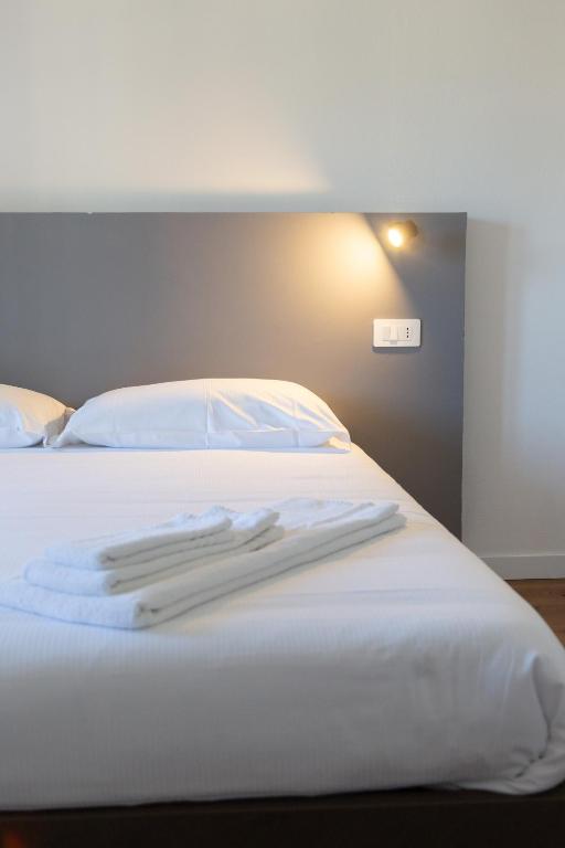 Postel nebo postele na pokoji v ubytování Albergo Panorama