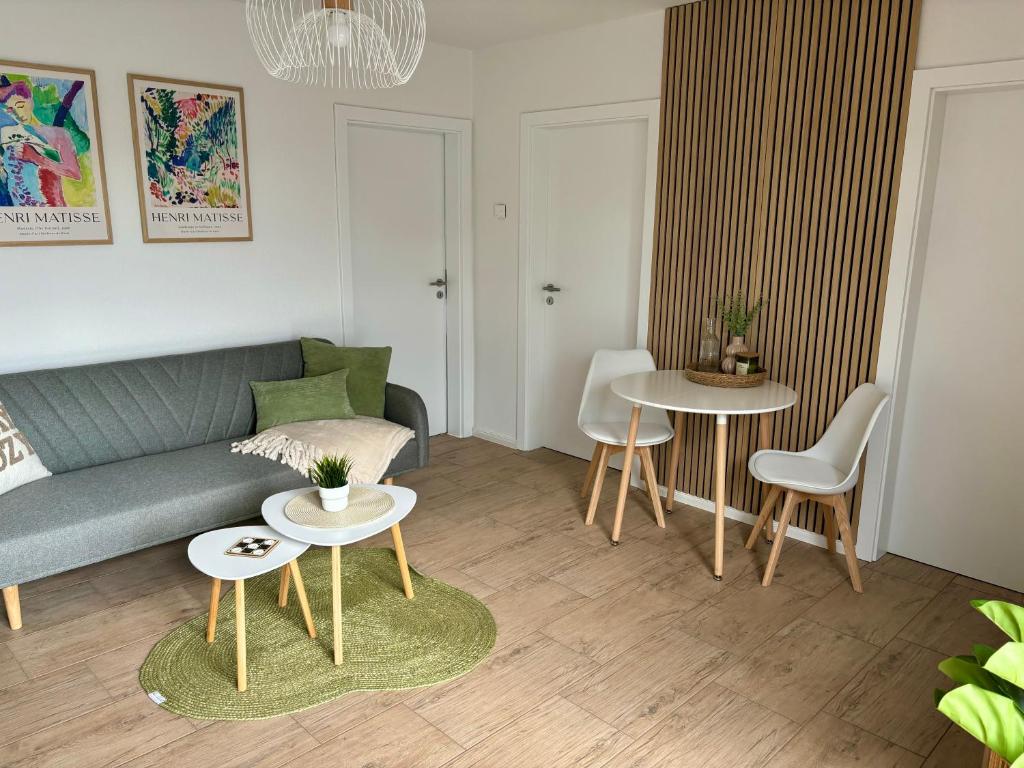 Гостиная зона в Home & Apart - Apartment im Herzen von Kreyenbrück - Apartment 1