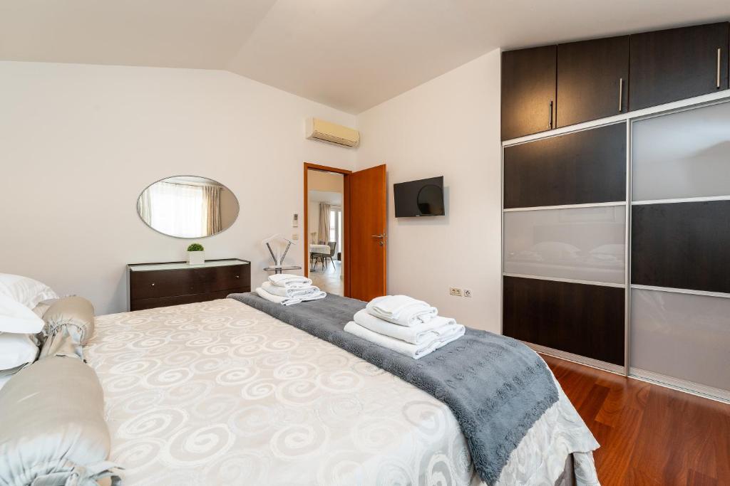 Postel nebo postele na pokoji v ubytování Apartments Very Good Life