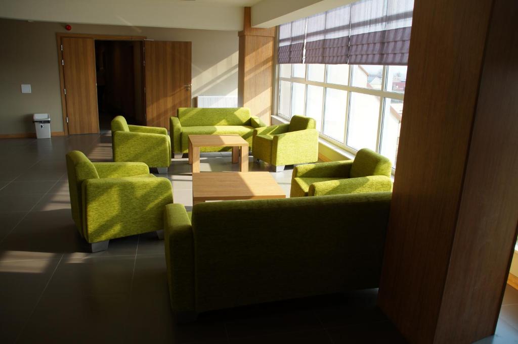 Posezení v ubytování Hotel ***NAT Sarbinowo