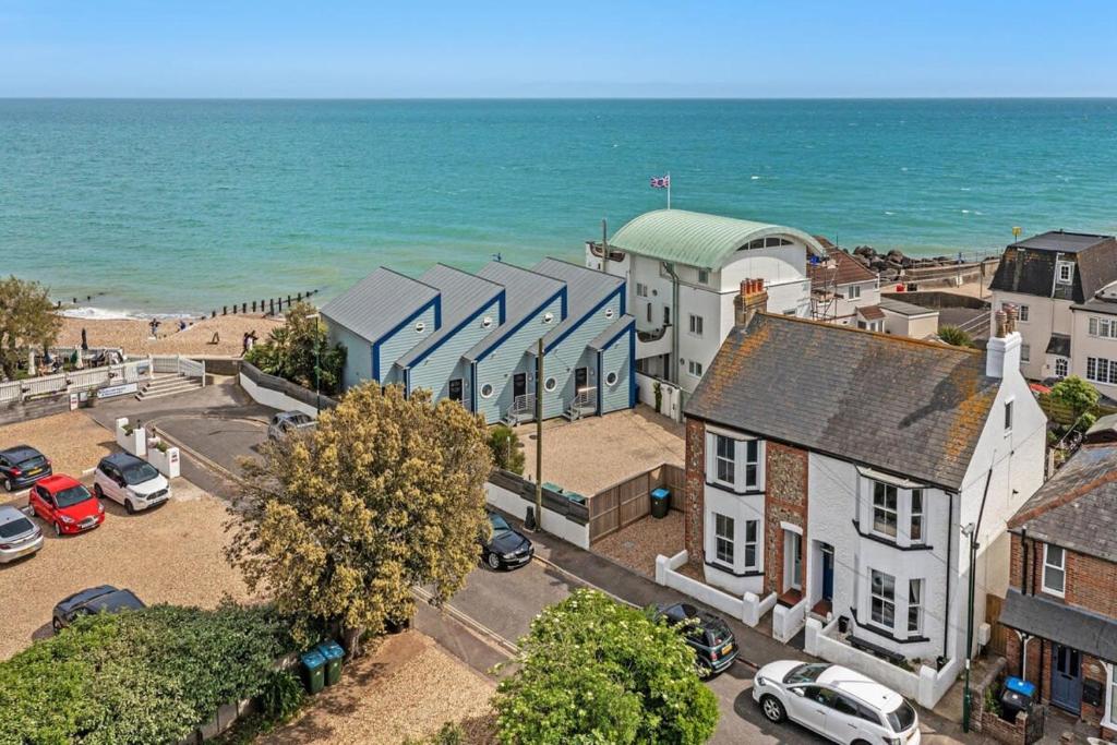 an aerial view of a town next to the beach at Lovely Seaside Villa & Gardens 40 Metres to Beach in Felpham