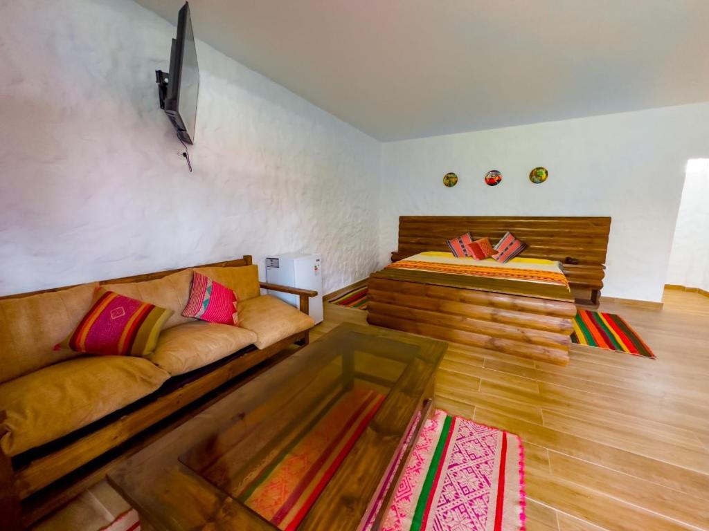 Posezení v ubytování HOTEL RUSTICA CIENEGUILLA