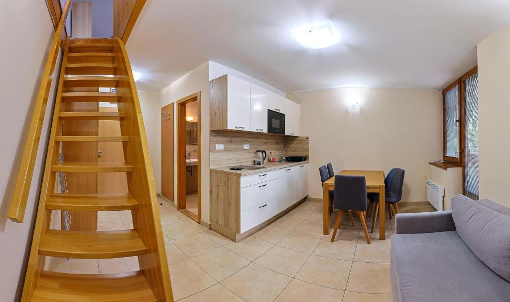 Kuchyň nebo kuchyňský kout v ubytování Apartmánový dom Fatrapark 1 s Wellness - Hlavná recepcia