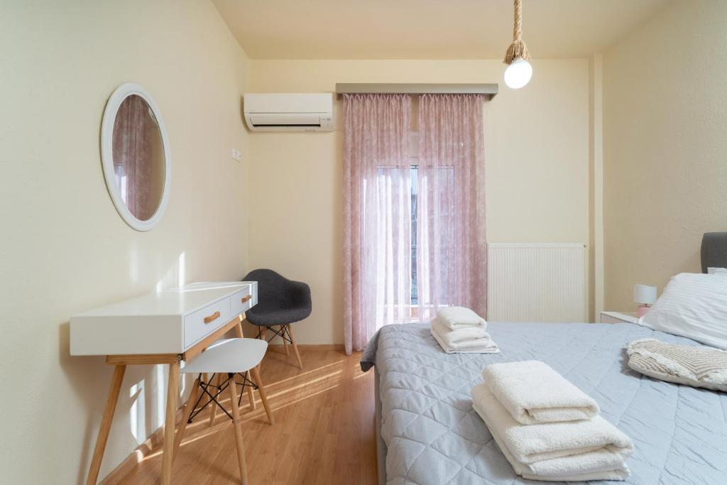Postel nebo postele na pokoji v ubytování Poline Apartment