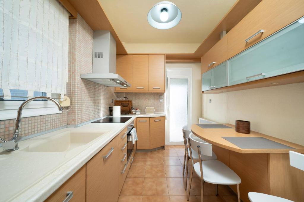 Kuchyň nebo kuchyňský kout v ubytování Poline Apartment