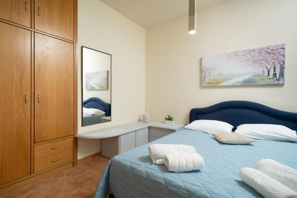 Postel nebo postele na pokoji v ubytování Poline Apartment