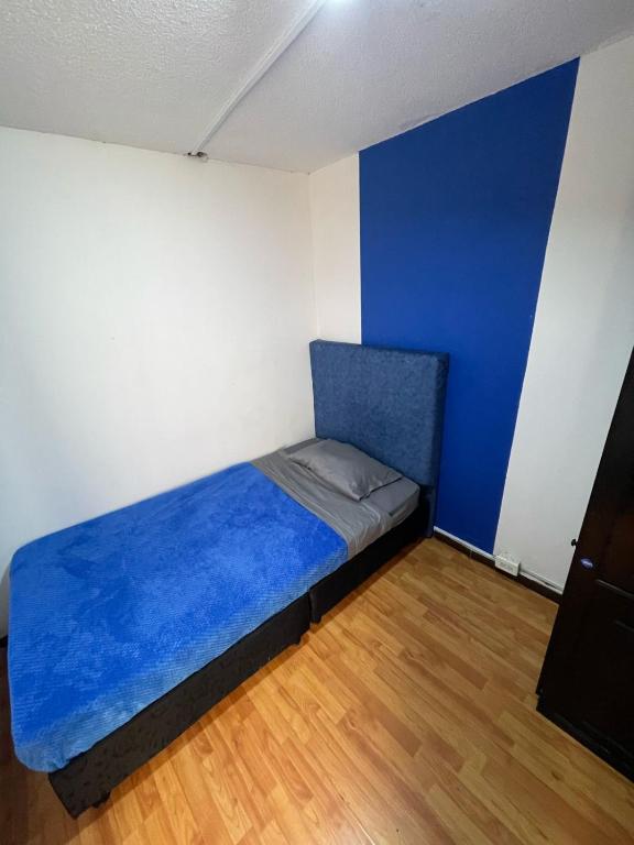 Postel nebo postele na pokoji v ubytování Hostel Bogotá Niza Tu sitio