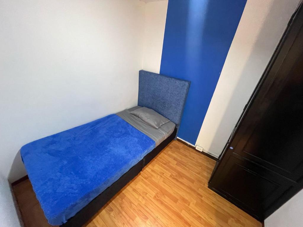 Postel nebo postele na pokoji v ubytování Hostel Bogotá Niza Tu sitio