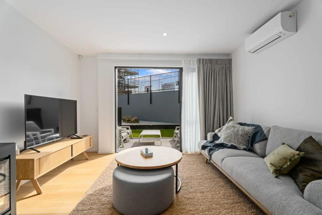 a living room with a couch and a table at Wilbro in Albert Town