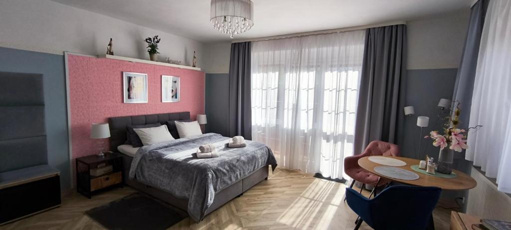 Pension Villa Marit tesisinde bir odada yatak veya yataklar