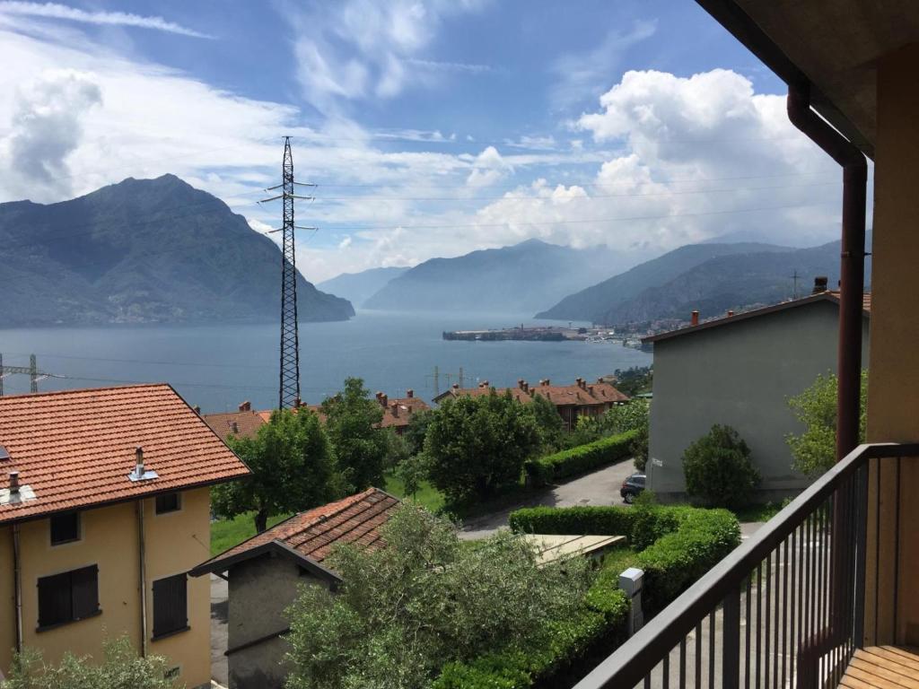 a view of the water from a balcony of a house at Casa46 in Costa Volpino