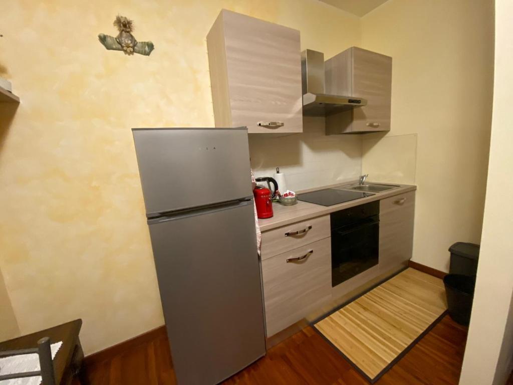 Kuchyň nebo kuchyňský kout v ubytování A appartamento Segrate