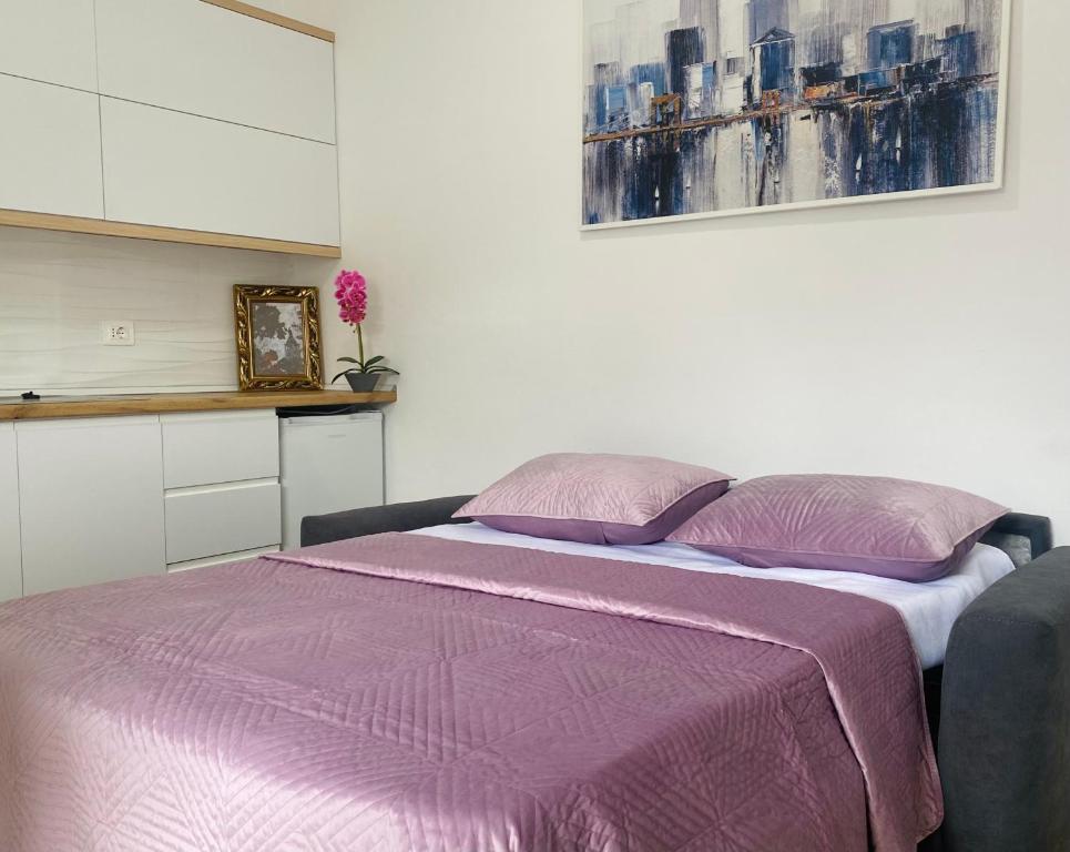 Postel nebo postele na pokoji v ubytování HC Hotel & Suites