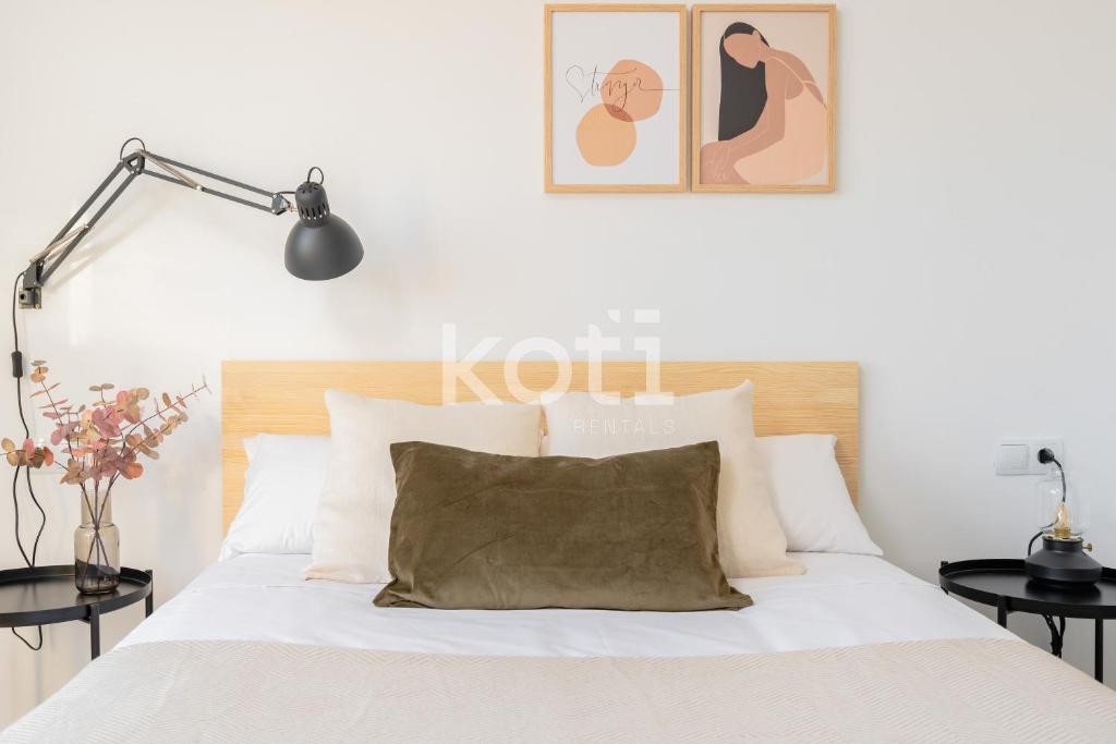 Postel nebo postele na pokoji v ubytování Koti Rentals - Nenúfar
