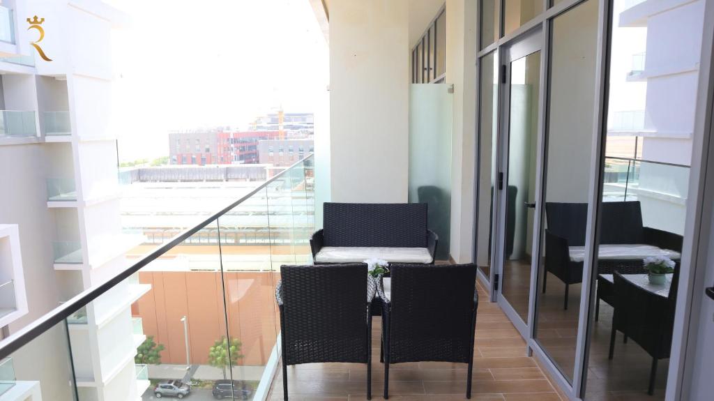 Posezení v ubytování ZenDen 1BR Apartment in Masdar city