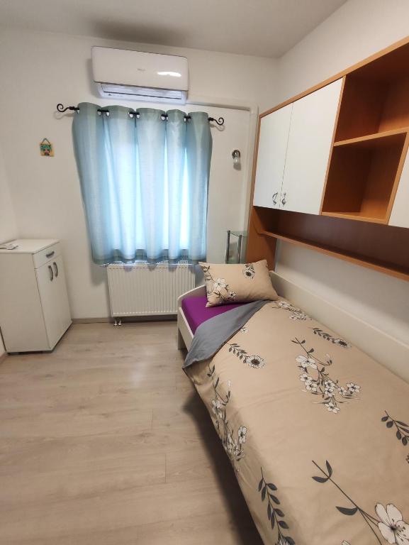 Postel nebo postele na pokoji v ubytování Kuća za odmor EMA