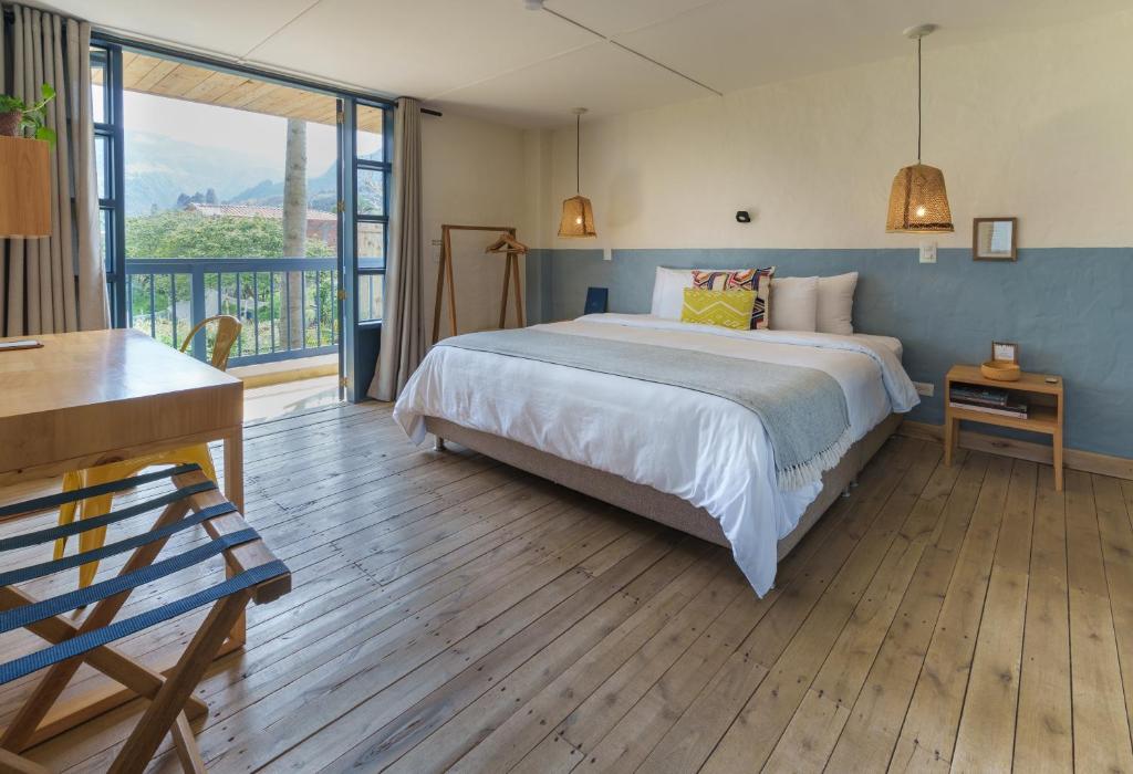 Postel nebo postele na pokoji v ubytování Hotel Plantación