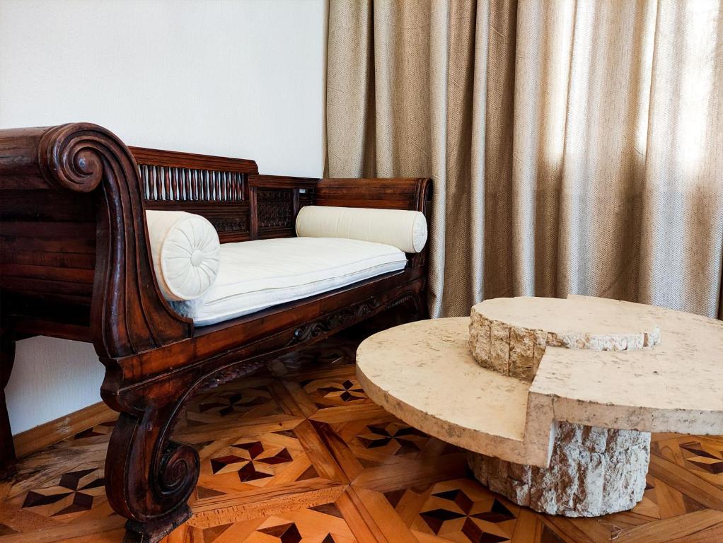 Postel nebo postele na pokoji v ubytování Veranda Boutique Hotel Kutaisi