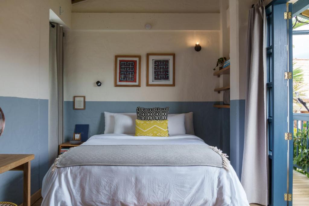 Postel nebo postele na pokoji v ubytování Hotel Plantación