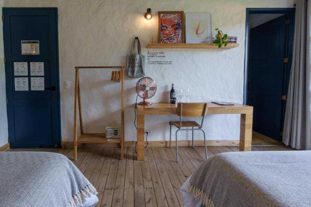 Postel nebo postele na pokoji v ubytování Hotel Plantación
