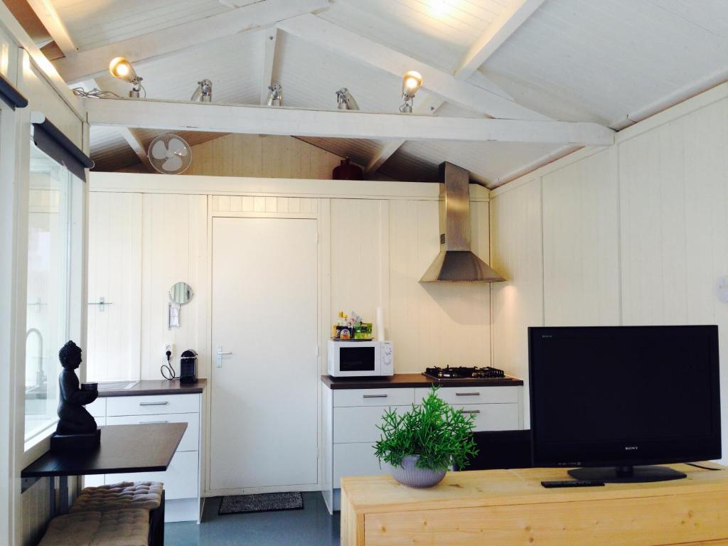 Kuchyň nebo kuchyňský kout v ubytování Tiny House Madame Jeanette