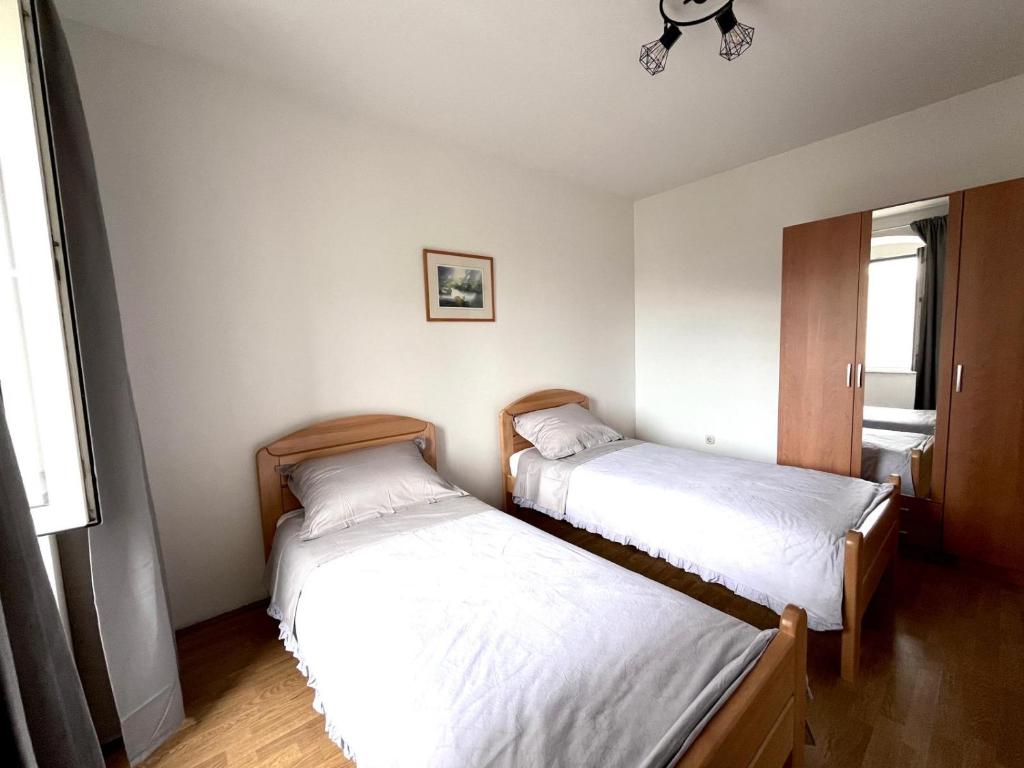 Posteľ alebo postele v izbe v ubytovaní Apartment Darka