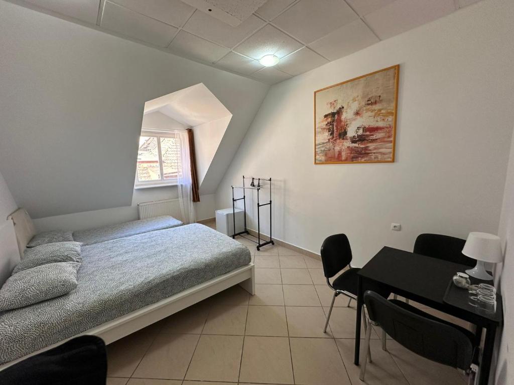 Posteľ alebo postele v izbe v ubytovaní Apartamenty Gołębia-Economic