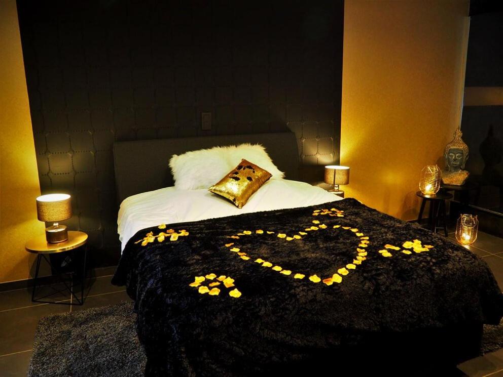 Postel nebo postele na pokoji v ubytování Symbiose hotel