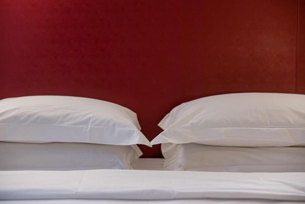 Postel nebo postele na pokoji v ubytování Best Western Hotel Armando