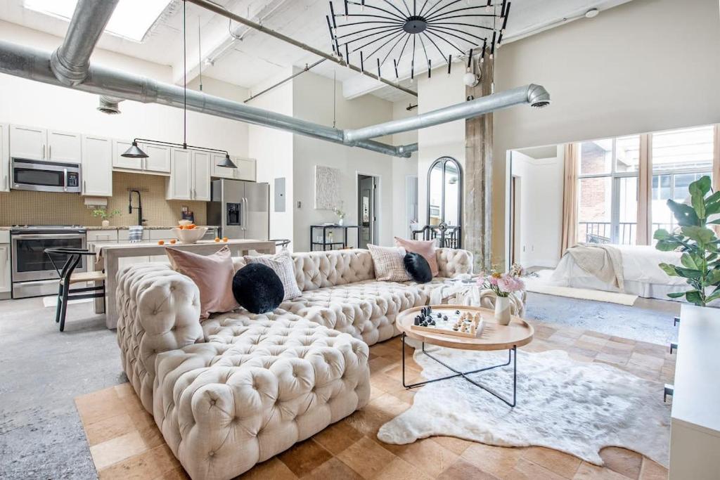 a living room with a couch and a table at Beltline Shrine in Atlanta