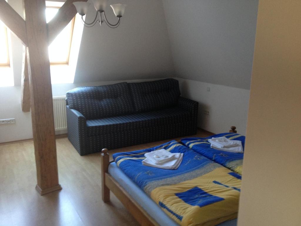 Postel nebo postele na pokoji v ubytování Hotel Atawa
