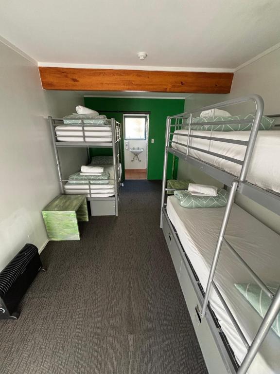 Letto o letti in una camera di Peppertree Lodge