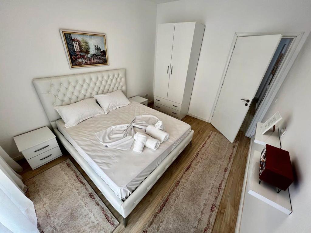 Un pat sau paturi într-o cameră la Palmas 717