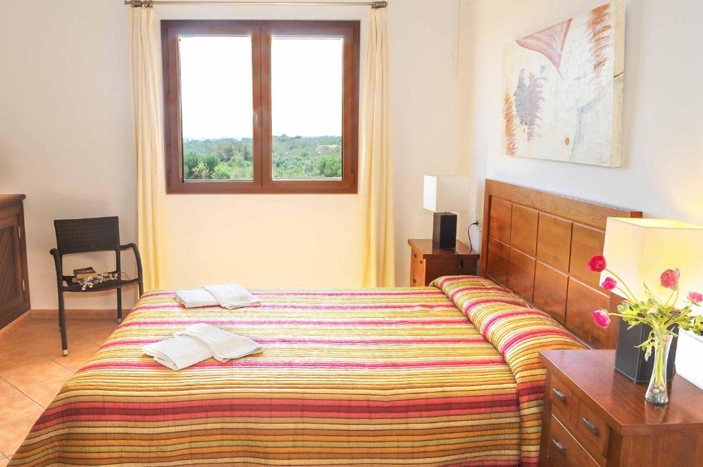 Postel nebo postele na pokoji v ubytování Villa Xiquetes